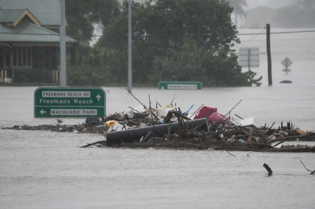 Debris sits in the middle of the flooded Windsor Bridge on the outskirts of Sydney, Australia.