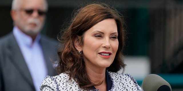 Michigan Gov. Gretchen Whitmer addresses the press before signing the final piece of a $76 billion state budget into law, Wednesday, July 20, 2022, in Detroit. 