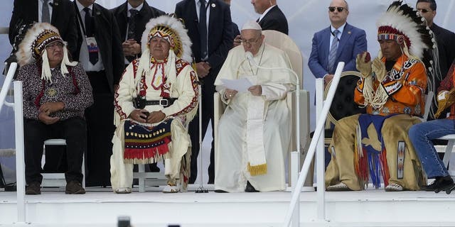 Pope Francis delivers his speech as he meets the indigenous communities, including First Nations, Metis and Inuit, at Our Lady of Seven Sorrows Catholic Church in Maskwacis, near Edmonton, Canada, Monday, July 25, 2022. Pope Francis begins a "penitential" visit to Canada to beg forgiveness from survivors of the country's residential schools, where Catholic missionaries contributed to the "cultural genocide" of generations of Indigenous children by trying to stamp out their languages, cultures and traditions. Francis set to visit the cemetery at the former residential school in Maskwacis. (AP Photo/Gregorio Borgia)