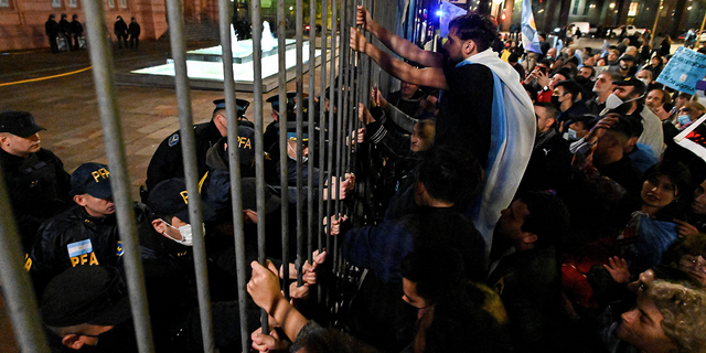 Opponents of the government of Argentina's President Alberto Fernandez hold a protest outside the Casa Rosada presidential palace in Buenos Aires, on July 9.