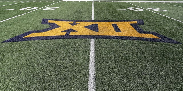 The Big 12 logo on the field prior to the college football game between the Texas Tech Red Raiders and the West Virginia Mountaineers on October 2, 2021, at Mountaineer Field at Milan Puskar Stadium in Morgantown, WV. 