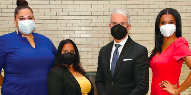 Alisa Blair, left, with fellow special advisers Shelan Joseph and Tiffiny Blacknell and DA George Gascon.