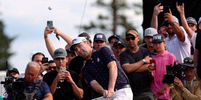 Branden Grace makes a chip shot for birdie on the 16th hole during the third round of the Portland Invitational LIV Golf tournament in North Plains, Ore., Saturday, July 2, 2022.