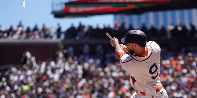 San Francisco Giants' Brandon Belt breaks his bat hitting an RBI single during the second inning of a baseball game against the Milwaukee Brewers in San Francisco, Sunday, July 17, 2022. 