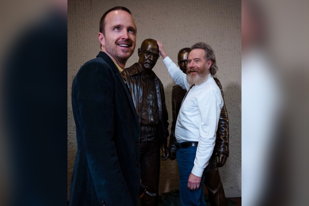 Statues with Aaron Paul and Bryan Crantson.