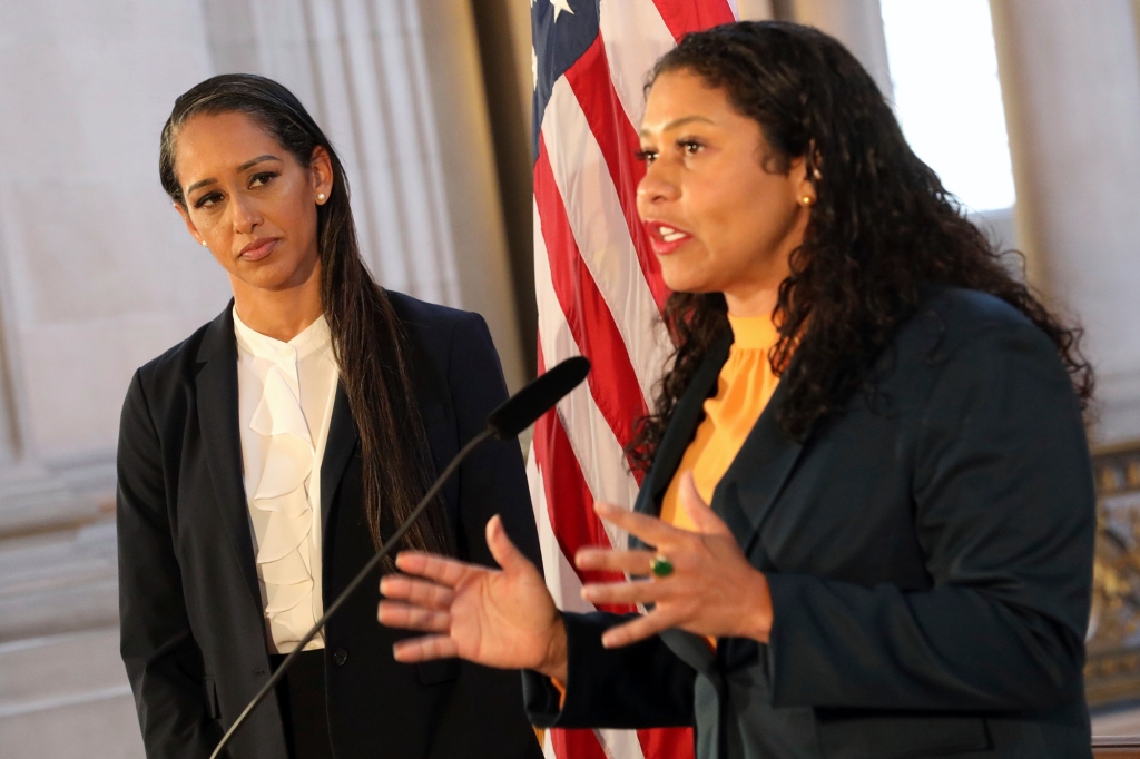 Mayor London Breed addresses a news conference as Brooke Jenkins looks on at City Hall, Thursday, July 7, 2022, in San Francisco.