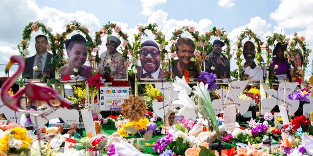 A memorial for the supermarket shooting victims outside Tops Friendly Market Thursday, July 14, 2022, in Buffalo, N.Y.