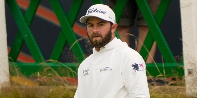 Cameron Young of the US on the 18th green during the first round of the British Open golf championship on the Old Course at St. Andrews, Scotland, Thursday July 14, 2022.