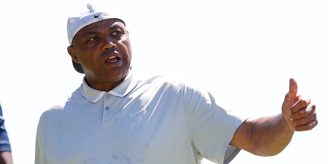 Basketball analyst and former NBA player Charles Barkley reacts to fans after putting on the 14th green during the final round of the American Century Championship at Edgewood Tahoe Golf Course July 10, 2022, in Stateline, Nev.