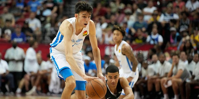 Oklahoma City Thunder's Chet Holmgren drives up the court against the Orlando Magic during the first half an NBA summer league basketball game Monday, July 11, 2022, in Las Vegas. 