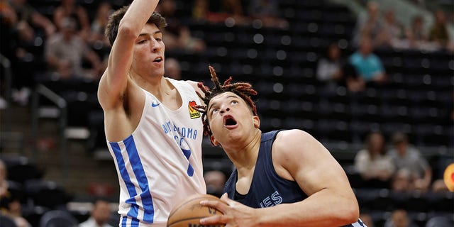 Memphis Grizzlies forward Kenny Lofton Jr. (6) looks to shoot against Oklahoma City Thunder forward Chet Holmgren (7) during the first half of an NBA summer league basketball game Wednesday, July 6, 2022, in Salt Lake City. 