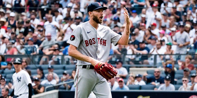 Boston Red Sox starting pitcher Chris Sale walks off the mound after a hand injury during the second inning of a baseball game against the New York Yankees, Sunday, July 17, 2022, in New York. 