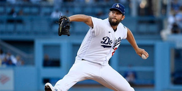 Starting pitcher Clayton Kershaw #22 of the Los Angeles Dodgers throws against the Chicago Cubs during the first inning at Dodger Stadium on July 9, 2022 in Los Angeles, California. 