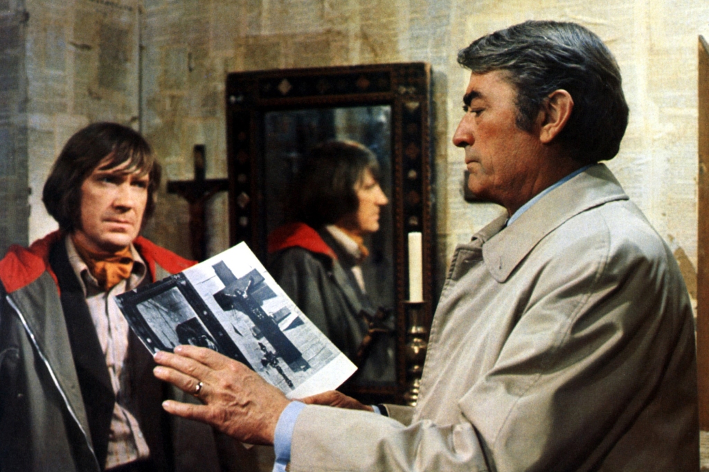 David Warner and Gregory Peck in "The Omen."