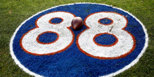 A detailed view of a ball on the #88 tribute logo to the late former Denver Broncos player Demaryius Thomas after the game against the Detroit Lions at Empower Field At Mile High on December 12, 2021 in Denver, Colorado. 