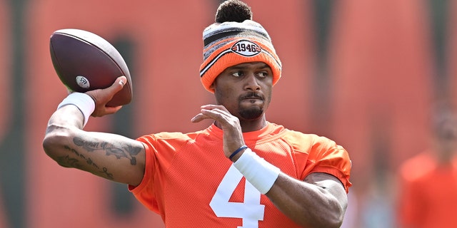 leveland Browns quarterback Deshaun Watson (4) throws a pass during organized team activities at CrossCountry Mortgage Campus.