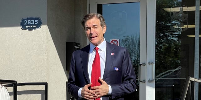 Republican Senate candidate Mehmet Oz leaving a polling station in Bryn Athyn, Pennsylvania, after voting in the state's GOP Senate primary, on May 17, 2022