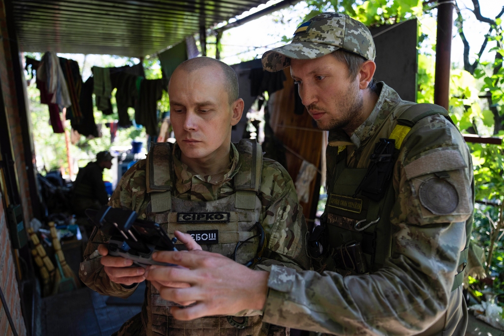 Ukrainian servicemen correcting artillery fire by drone at the frontline near Kharkiv, Ukraine, on Saturday, July 2, 2022.