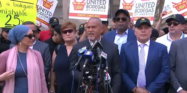 United Bodegas of America co-founder Fernando Mateo at a press conference Tuesday outside the Manhattan District Attorney's Office. The woman on the left in pink sweater is Debbie Almontaser, a representative of the Yemeni American Merchants Association.