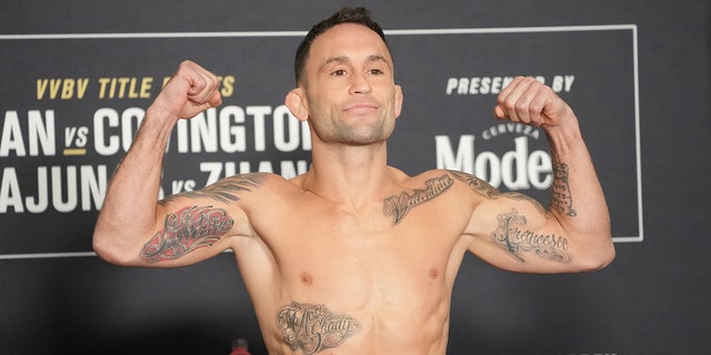 Frankie Edgar steps on the scale during the official weigh-in for UFC 268 on November 5, 2021, at Hilton Midtown in New York, NY.