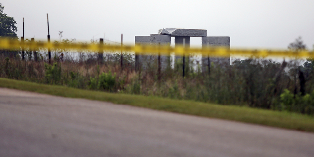 Police tape blocks off the damaged Georgia Guidestones monument near Elberton, Ga., on Wednesday, July 6.