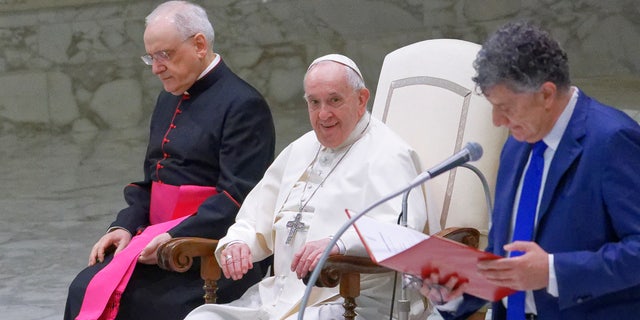 Pope Francis arrives to attend his weekly general audience in the Paul VI Hall at The Vatican, Wednesday, April 13, 2022. (Photo by Massimo Valicchia/NurPhoto via Getty Images)