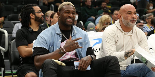 DK Metcalf attends a WNBA game between the Los Angeles Sparks and the Seattle Storm at the Climate Pledge Arena in Seattle, Washington, on June 25, 2022.