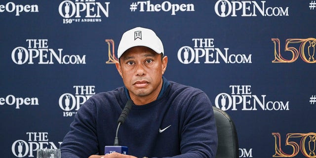 Tiger Woods listens during a press conference following practice for The 150th Open Championship on The Old Course at St Andrews on July 12, 2022, in St. Andrews, Scotland. 