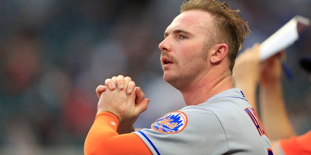 Pete Alonso (20) of the New York Mets looks on during the Tuesday evening MLB game between division rivals the Atlanta Braves and the New York Mets on July 12, 2022, at Truist Park in Atlanta, Georgia.    