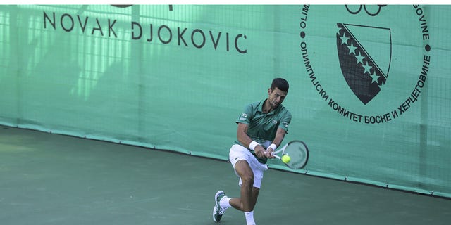 Wimbledon champion Novak Djokovic attends an opening ceremony of a new tennis complex and local tournaments in Visoko, Bosnia and Herzegovina, July 13, 2022. 