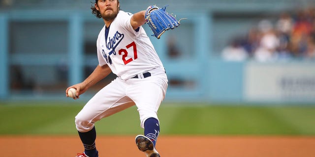 Trevor Bauer #27 of the Los Angeles Dodgers throws the first pitch of the game against the San Francisco Giants at Dodger Stadium on June 28, 2021 in Los Angeles, California. 