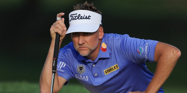 Ian Poulter of England looks over a putt on the 15th green during the first round of the Arnold Palmer Invitational presented by Mastercard at Arnold Palmer Bay Hill Golf Course March 3, 2022, in Orlando, Fla. 