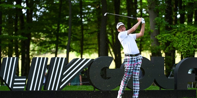 Ian Poulter of Majesticks GC tees off on the fifth hole during day two of the LIV Golf Invitational - London at The Centurion Club on June 10, 2022 in St Albans, England. 