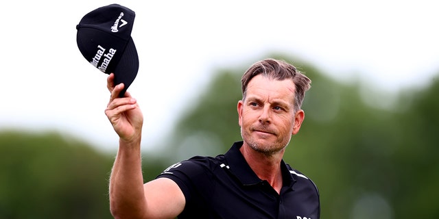 Henrik Stenson acknowledges the crowd during the Volvo Car Scandinavian Mixed at Halmstad Golf Club on June 12, 2022, in Halmstad, Sweden.