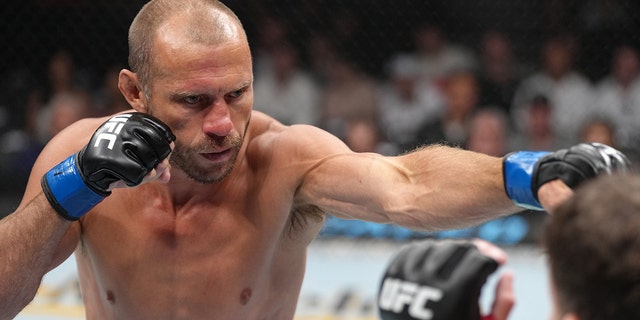 Donald Cerrone strikes at Jim Miller in a welterweight fight during the UFC 276 event at T-Mobile Arena on July 02, 2022 in Las Vegas, Nevada. (Photo by Jeff Bottari/Zuffa LLC)