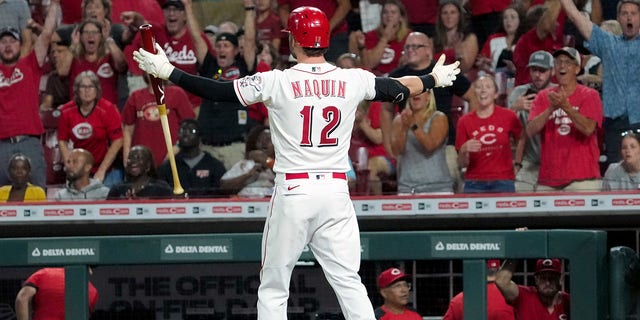 Tyler Naquin of the Cincinnati Reds celebrates after Matt Wisler of the Tampa Bay Rays balked to end a game 2-1 in the 10th inning at Great American Ball Park July 8, 2022, in Cincinnati.