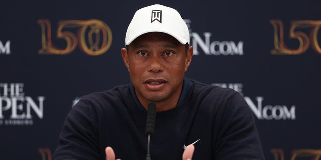 Tiger Woods of the United States speaks in a press conference during a practice round prior to The 150th Open at St Andrews Old Course on July 12, 2022, in St Andrews, Scotland. 