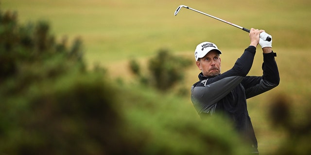 Henrik Stenson plays his second shot on the fourth hole during The 150th Open at St. Andrews Old Course on July 15, 2022, in St. Andrews, Scotland.