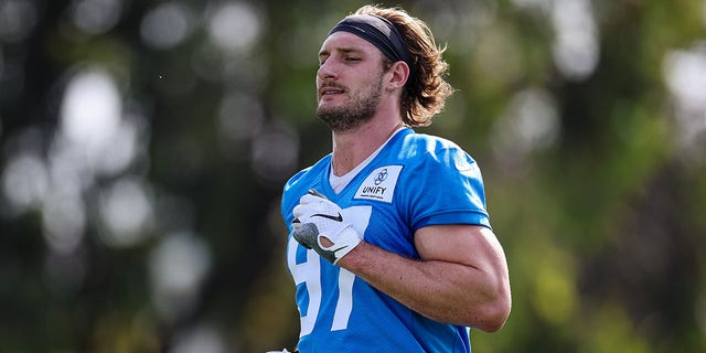 Joey Bosa of the Los Angeles Chargers warms up during training camp at Jack Hammett Sports Complex July 27, 2022, in Costa Mesa, Calif. 