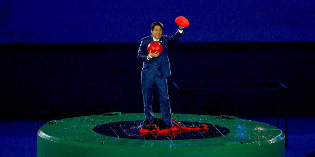 Japan Prime Minister Shinzo Abe is seen during the 'Love Sport Tokyo 2020' segment during the Closing Ceremony on Day 16 of the Rio 2016 Olympic Games at Maracana Stadium in Rio de Janeiro, Brazil on August 21, 2016.