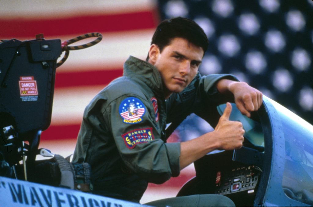 "Top Gun" was one of Cruise's first action roles in 1986. He starred as fighter pilot Pete "Maverick" Mitchell alongside Kelly McGinnis, Val Kilmer, and Tom Skerrit.
