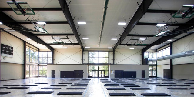 Beds are laid out in a cooling center at the Charles Jordan Community Center in Portland, Ore., July 26, 2022. 