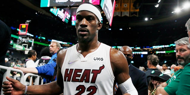 Miami Heat's Jimmy Butler leaves the court after the team's win over the Boston Celtics during Game 6 of the NBA basketball playoffs Eastern Conference finals Friday, May 27, 2022, in Boston. 