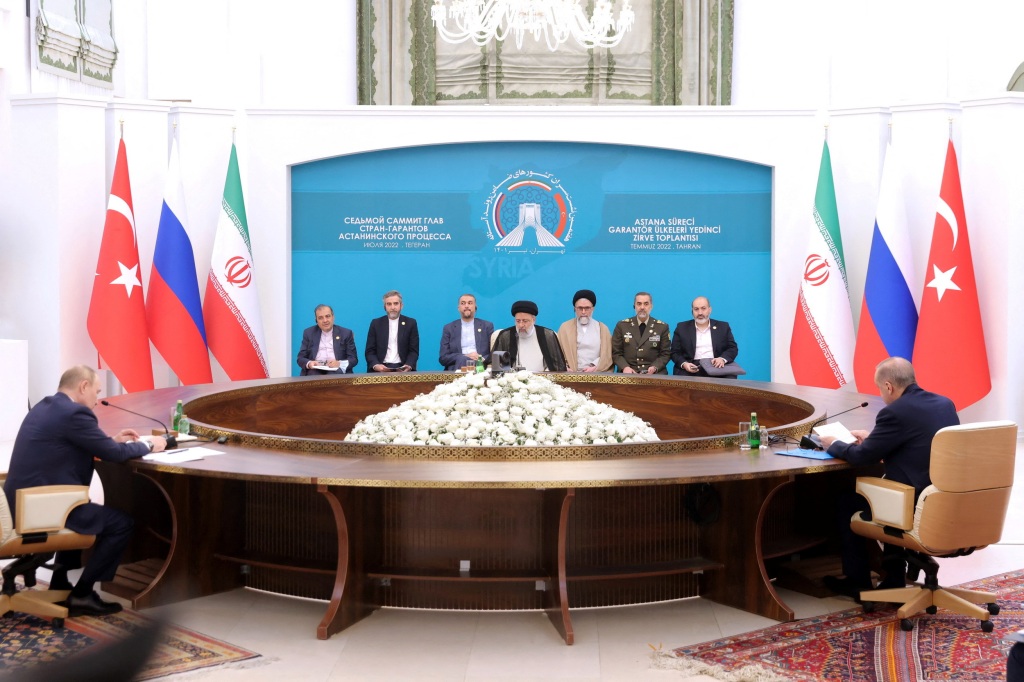 Russian President Vladimir Putin, Iranian President Ebrahim Raisi and Turkish President Tayyip Erdogan attend a summit of leaders in Tehran on July 19, 2022. 