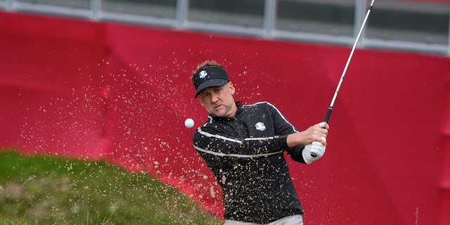 Team Europe's Ian Poulter hits to the ninth green during a practice day at the Ryder Cup at the Whistling Straits Golf Course Thursday, Sept. 23, 2021, in Sheboygan, Wis.