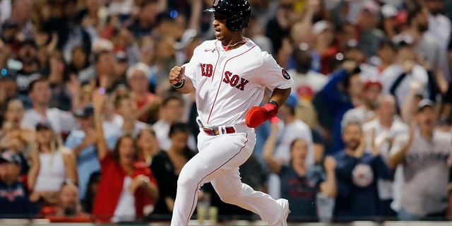 Jeter Downs of the Boston Red Sox scores on a single by Alex Verdugo during the eighth inning of the team's game against the New York Yankees Saturday, July 9, 2022, in Boston. 