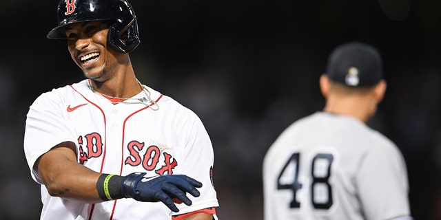 Jeter Downs of the Boston Red Sox reacts after his first career hit and RBI in the tenth inning against the New York Yankees at Fenway Park July 9, 2022, in Boston. 