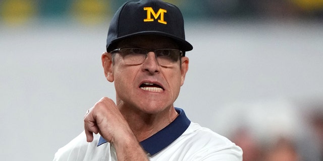 Michigan Wolverines head coach Jim Harbaugh prior to the Orange Bowl college football CFP national semifinal game against the Georgia Bulldogs at Hard Rock Stadium in Miami Gardens, Florida Dec. 31, 2021.