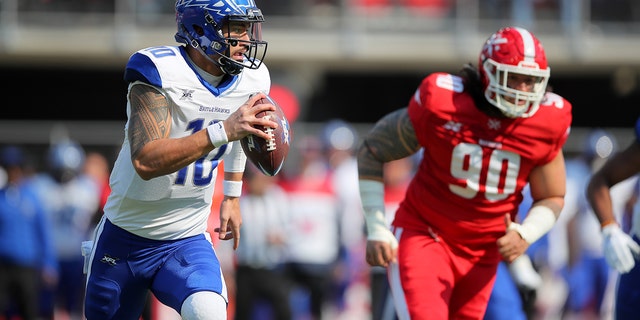 Jordan Ta'amu, #10 of the St. Louis BattleHawks, scrambles during the XFL game against the DC Defenders at Audi Field on March 8, 2020 in Washington, DC.