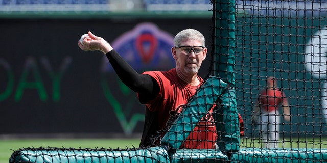 Bullpen catcher Joseph Stretch Suba of the Houston Astros throws a pitch during batting practice prior to a game on September 11, 2011 against the Washington Nationals at Nationals Park in Washington, DC.